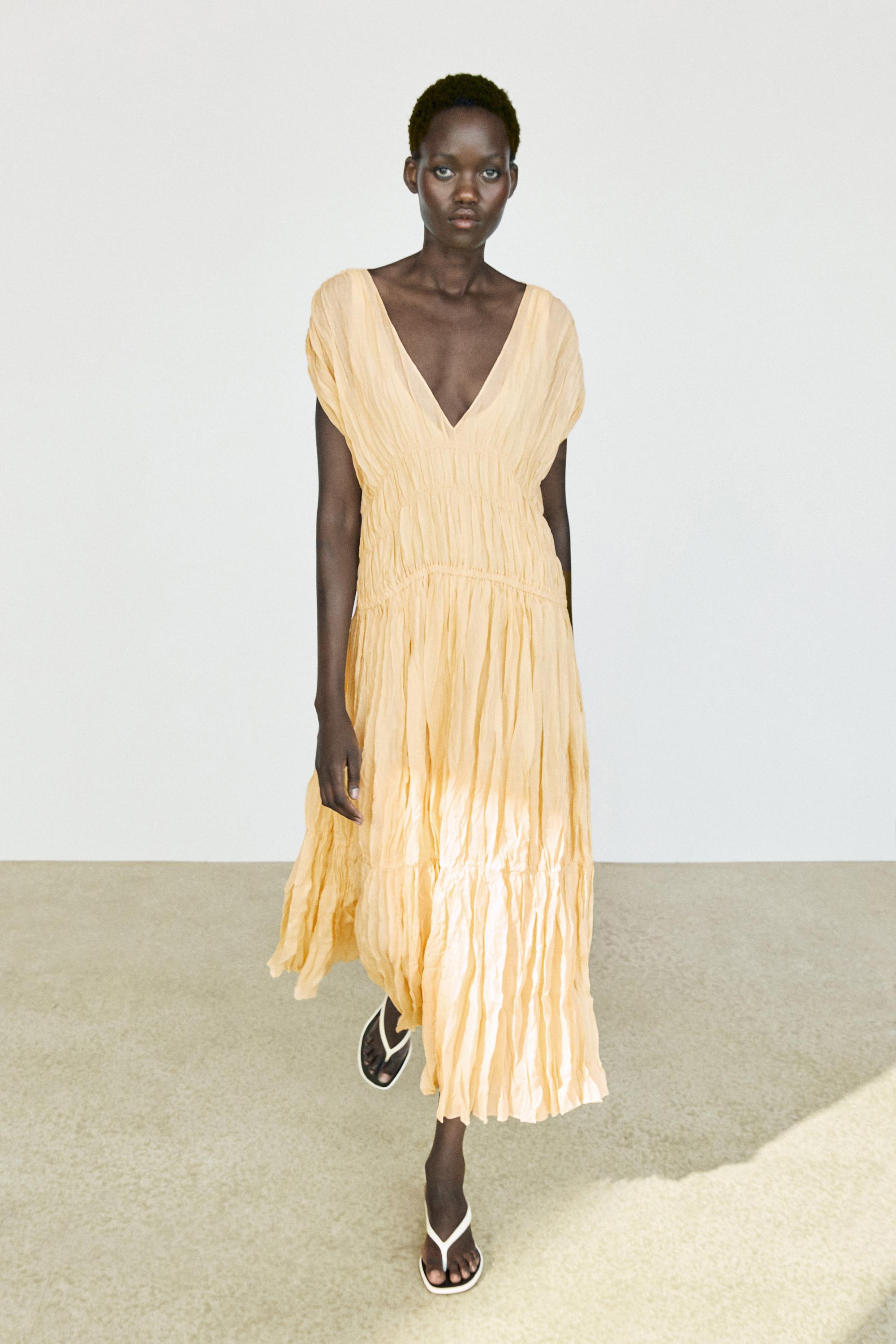 Robe midi fluide froncée